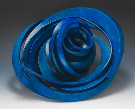 3d blue sculpture, formed of rings of metal