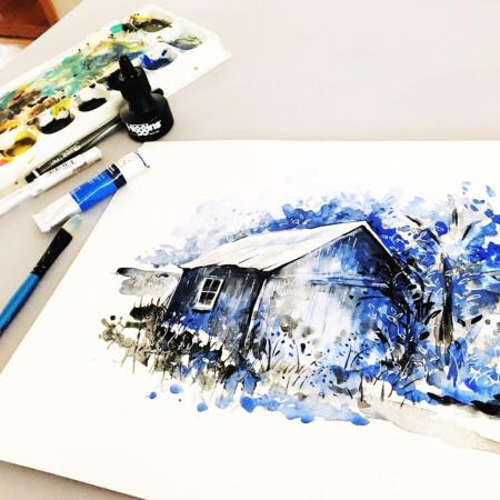 photograph of a painting in process, depicting a blue house