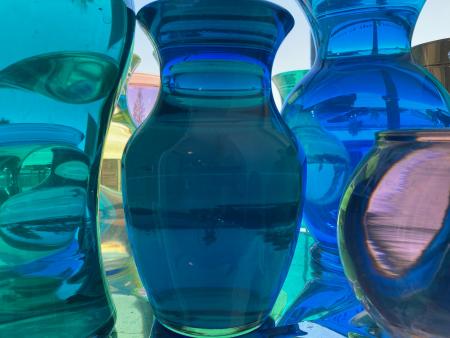 Image of colorful glassware installation by Rebecca Keller, "Meniscus"